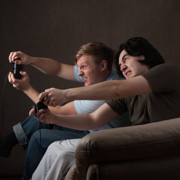 guys men playing video games playstation vpn services